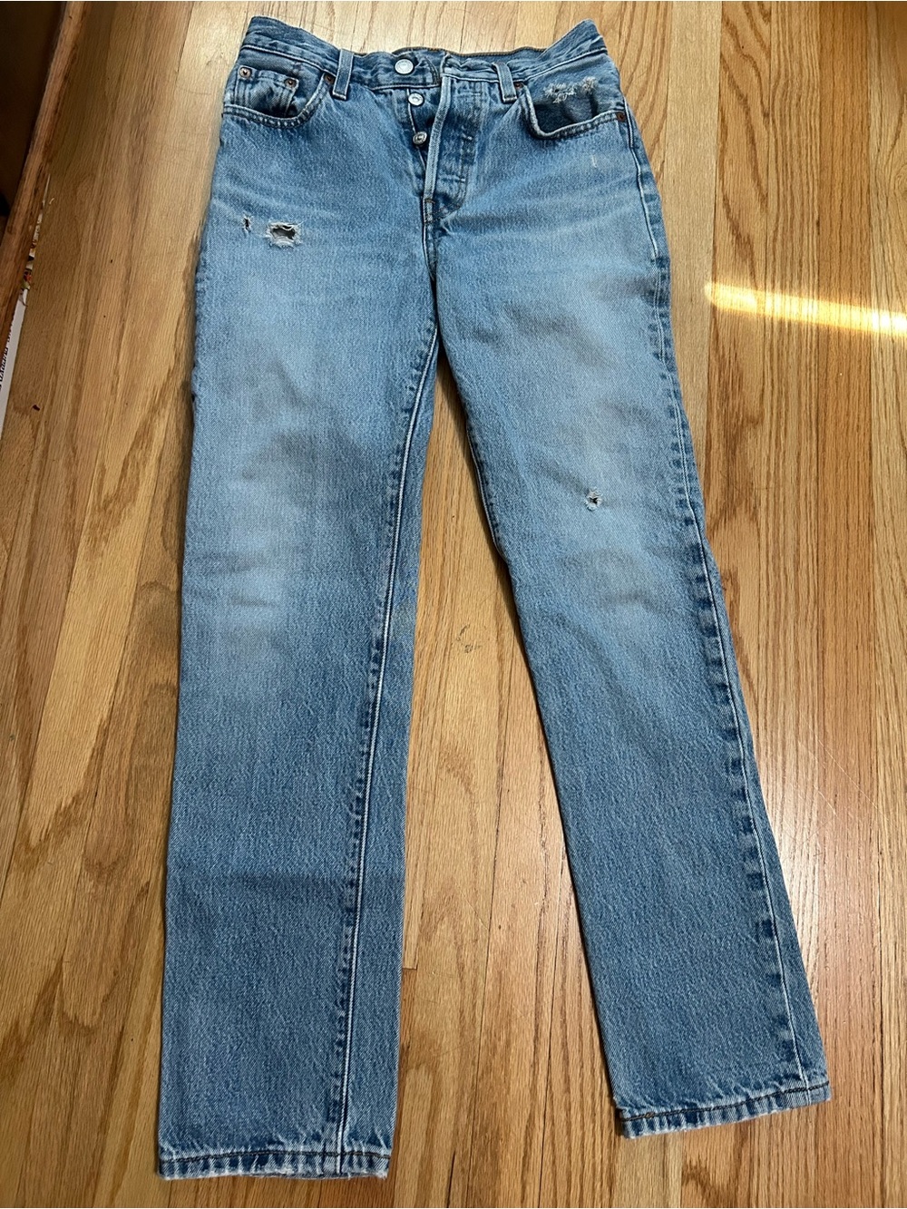 Classic quality, Levi premium blue jeans, straight leg button closure W 23 L 30